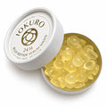 An open container of IOKURO 24H Jelly Peptide Serum Shots showing translucent yellow capsules, perfect for replenishing your eco-refill skincare routine, made in Italy.